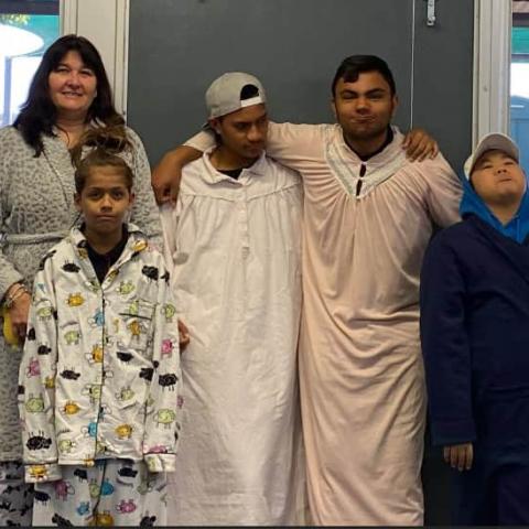 Mrs Spina and students wearing pyjamas for a good cause.